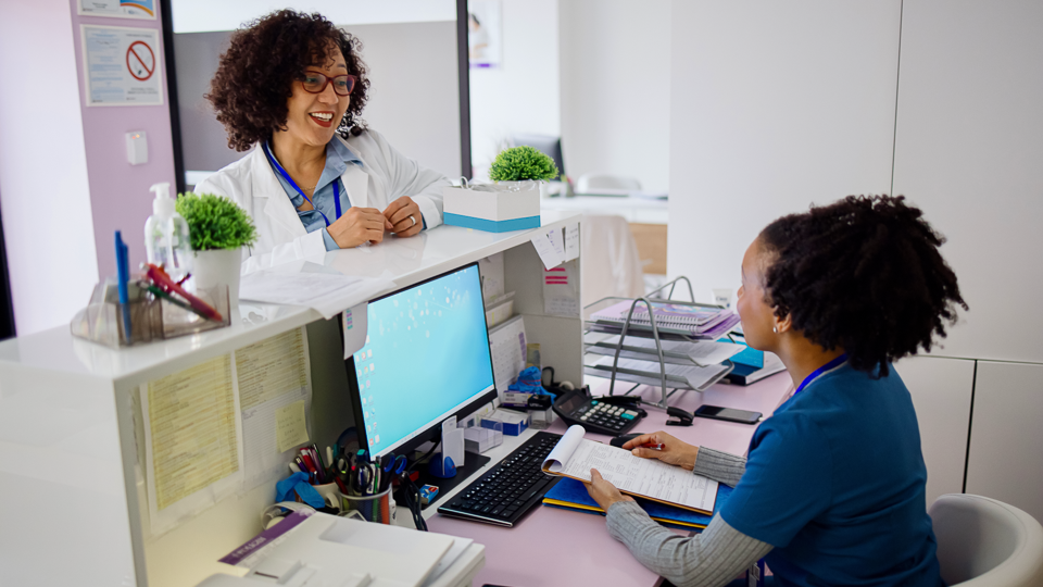 Two medical professionals in conversation