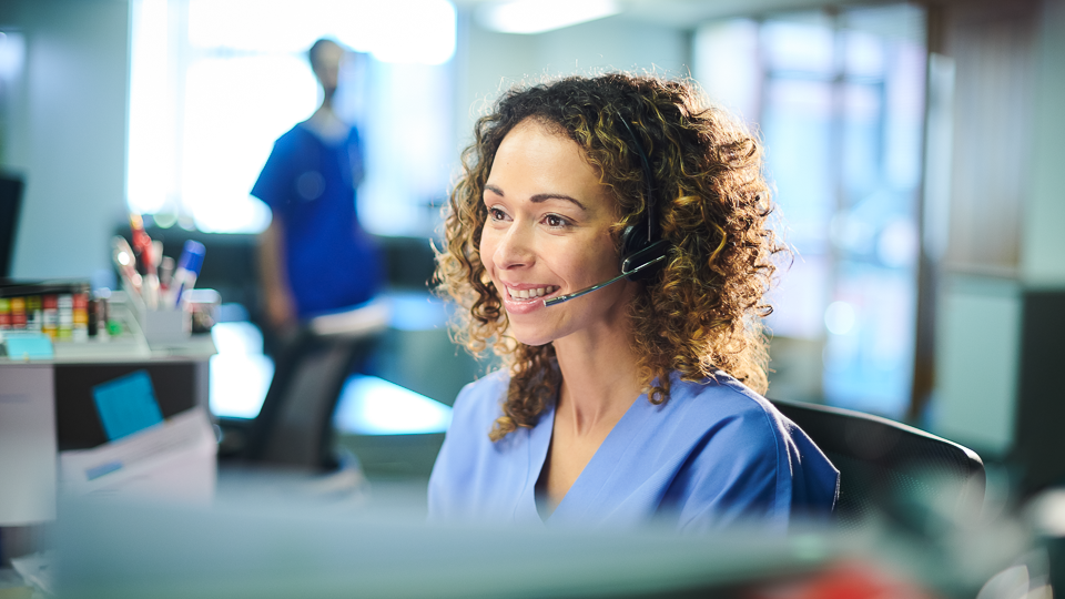 woman answering telephone call