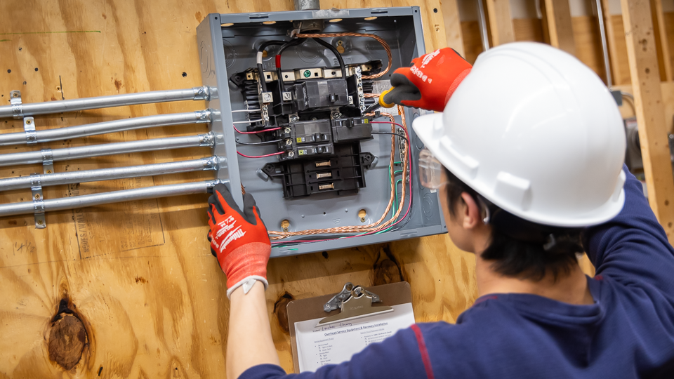 man working on electrical equipment